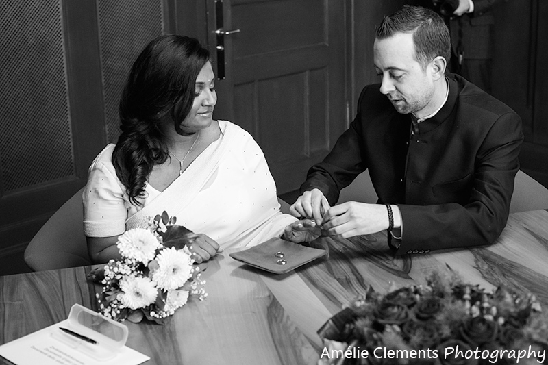 wedding_photographer_zurich_indian_swiss_wedding_Zurisee_stadthaus_rings_exhange_winter _amelie_clements_photography