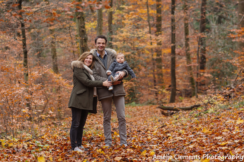 family-photographer-zurich-baby-switzerland-winter-forest-photosession-amelie-clements-photography-babyboy-parents-portrait-zuriberg-tree-autumn-colors