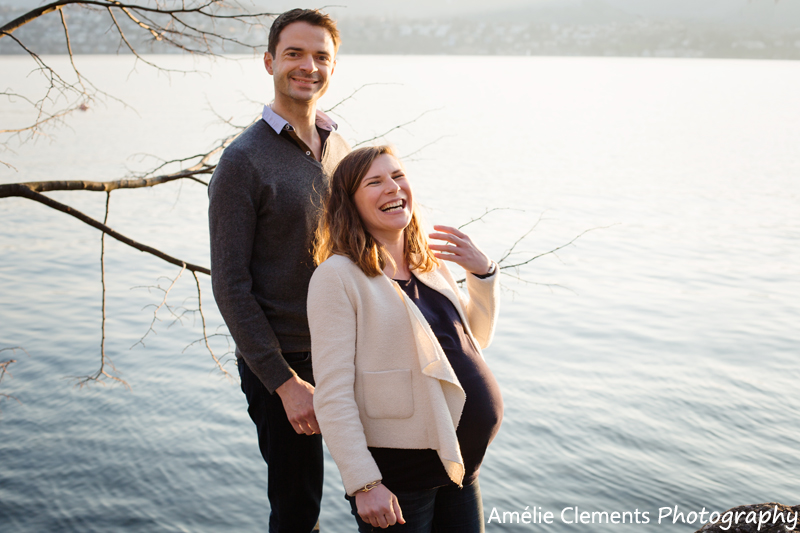 pregnancy-photographer-zurich-maternity-shoot-lake-zurisee-sunset-amelie-clements-photography-family-outdoors-parents-laughs